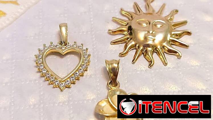 Dijes de oro 10k en forma de corazón 120 usd  y Flor 100 usd