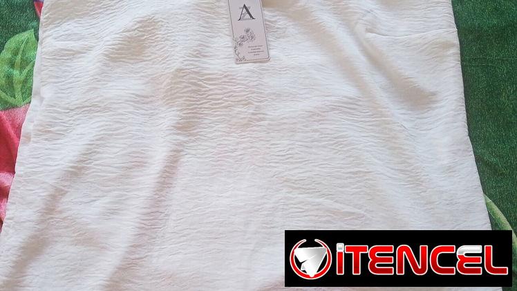 Blusas blancas y color crema