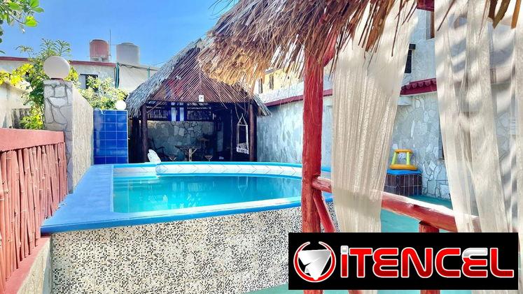 ALOJAMIENTO CON PISCINA A UNA CUADRA DE LA PLAYA DE GUANABO CUENTA CON 4 HABITACIONES.58858577