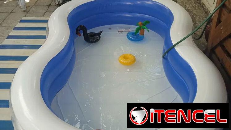 Vendo piscina inflable con bomba manual y butaca inflable. 58943104