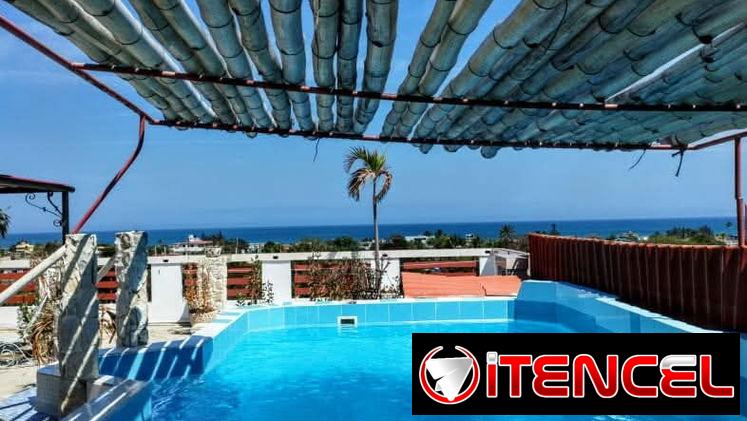 Reserva casa con piscina, billar, mirador, terraza para 15 personas en Guanabo con días disponibles