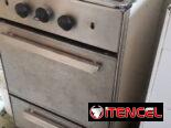 Se vende cocina de gas reconstruida de 4 hornillas con horno. 56044154