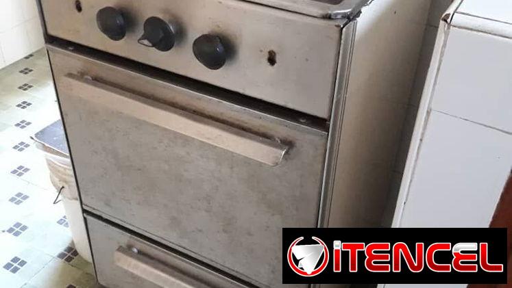 Se vende cocina de gas reconstruida de 4 hornillas con horno. 56044154