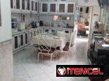 Vendo casa habilitada para rentar de 4 habitaciones, 4 baños y garaje cerca de la Ciudad Deportiva.