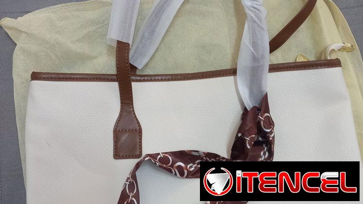Cartera de mujer en 12 usd o al cambio