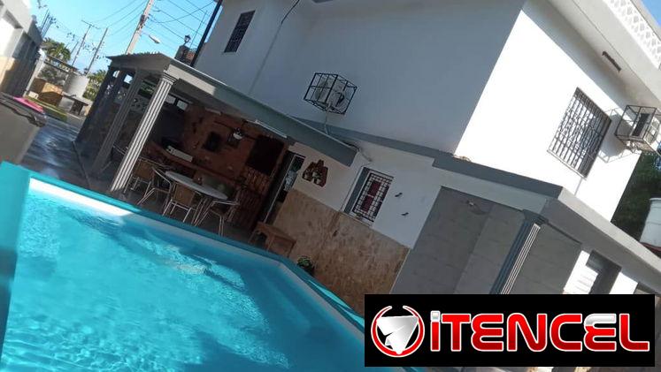 Se renta casa para vacaciones en Boca Ciega de 3 habitaciones con piscina.58858577