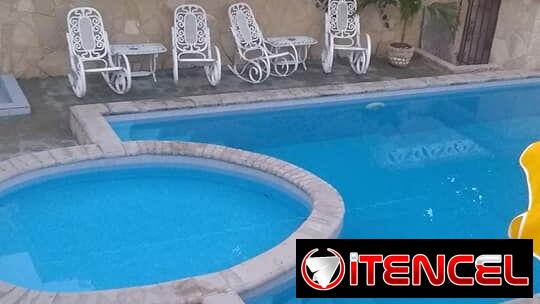 SE RENTA CASA DE 4 HABITACIONES A 5 CUADRAS DE LA PLAYA DE GUANABO. CON PISCINA.54026428
