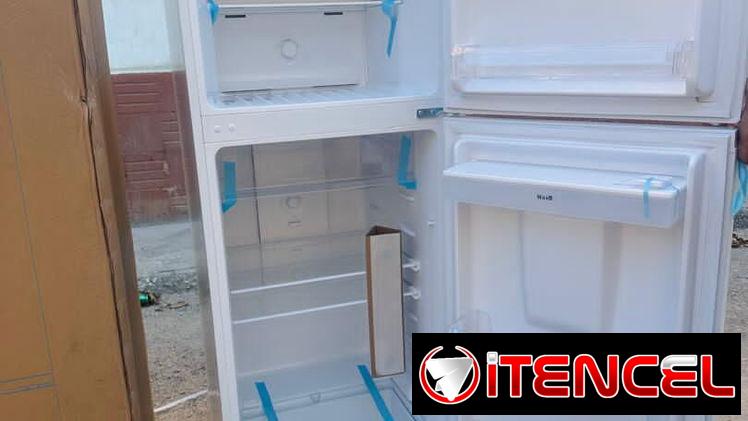 Refrigerador marca premium de 11.7 pies con dispensador  Congelación seca   500 USD con transporte  incluido