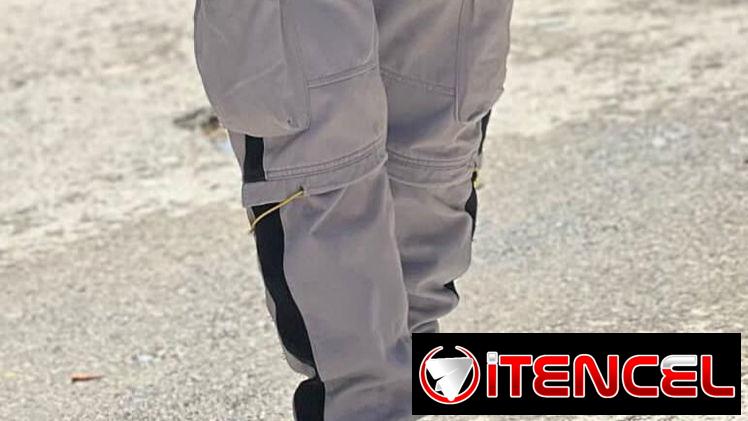 Pantalón 4 puertas gris talla 30-32