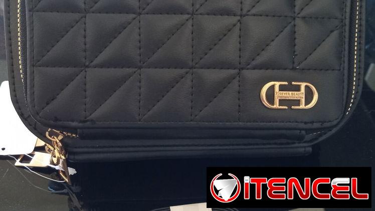 Cartera de mujer portacelular con asas ajustables