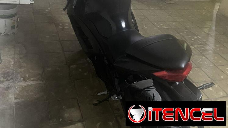 Vendo moto eléctrica racing batería michosuki haciendo 80 km por carga papeles en regla en  2500 usd interesados llamar
