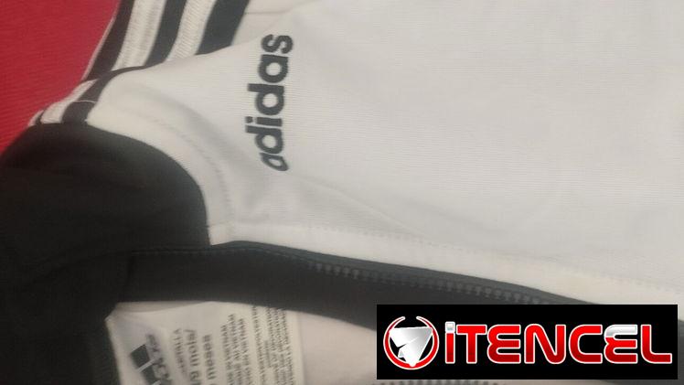 Bello  conjunto de pantalón y chaqueta de mangas largas,  de varón,  marca ADIDAS, talla 9 meses (GRANDE) en 5800 cup