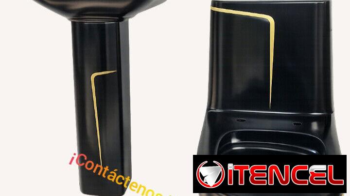 Juego de baño negro con detalles dorados