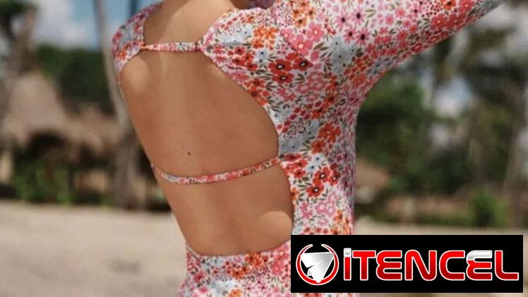 Trusa enteriza con estampado floral en tono rosa y escote de espalda