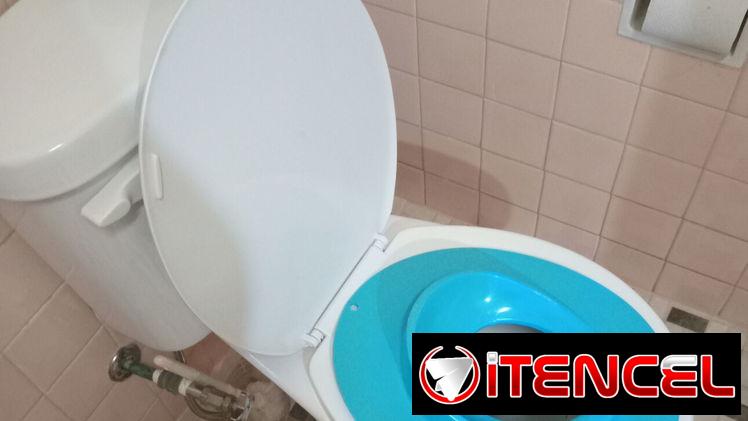 Asiento portátil para inodoro para bebés