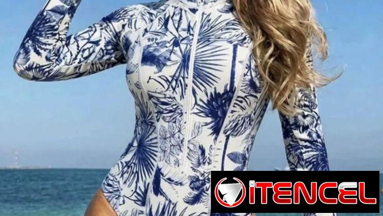 Trusa enteriza de mangas largas con estampado azul y blanco