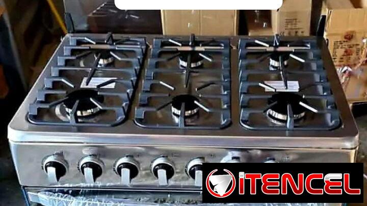 Cocina de gas con horno de 6 quemadores con magneto marca Rudenkov