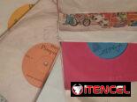 Vendo discos de pasta long play y de 45 rpm.