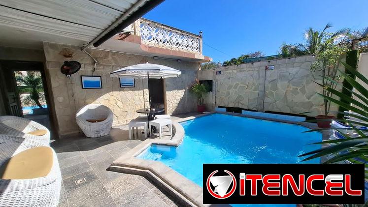 SE RENTA CASA DE 3 cuartos CON PISCINA A MEDIA CUADRA DE LA PLAYA DE GUANABO. 58858577