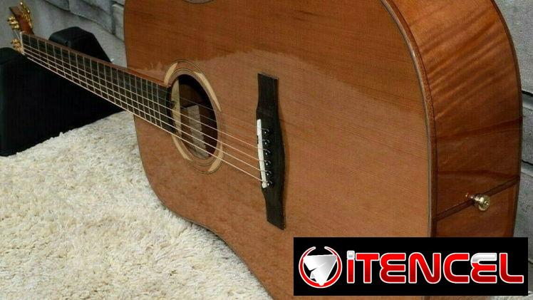 Acoustic Guitar New model Solid Cedar Top, (Canadian brand)