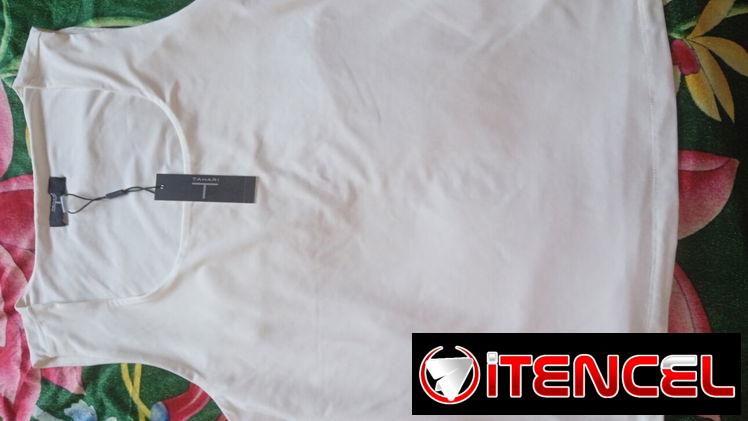Blusas blancas y color crema