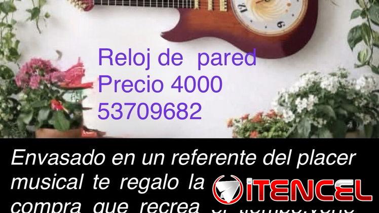 Reloj de pared en forma de guitarra