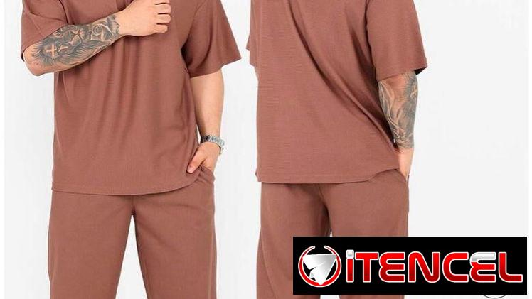 Conjunto de pullovers y pantalón de hombre.