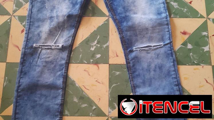 Pantalón de mezclilla elastizado talla 38.