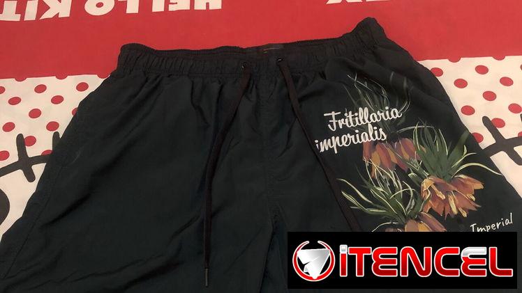 Shores verde, uno con flores , marca HM. Talla L o 32.