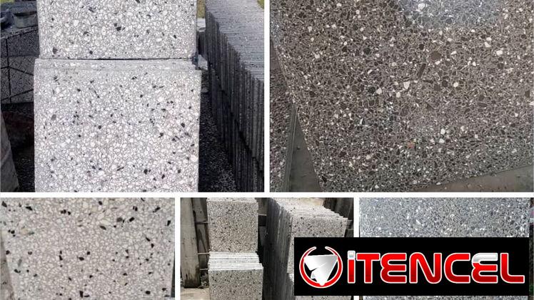 Losas de granitos de dos tonos gris oscuras y blancas de 40×40 con rodapie