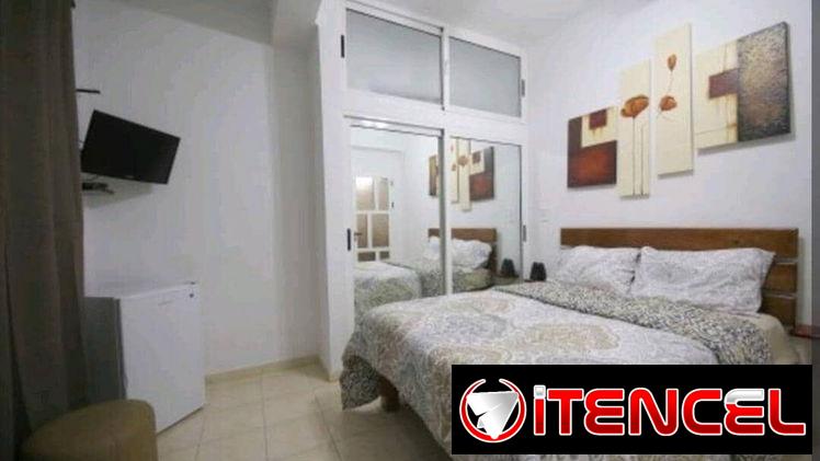 Renta de moderno apartamento a media cuadra de 23 y malecón