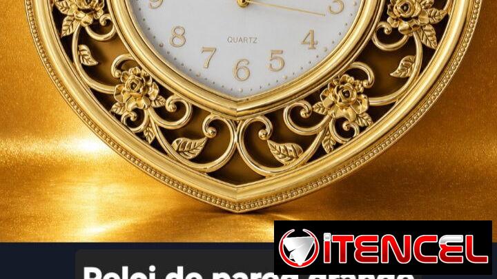 Reloj grande dorado para la pared
