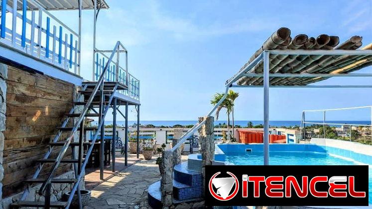 Reserva casa con piscina, billar, mirador, terraza para 15 personas en Guanabo con días disponibles