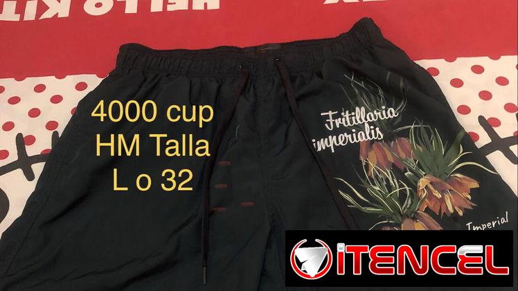 Short verde oscuro marca HM talla 32.