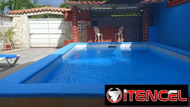 Casa con 8 habitaciones climatizadas y piscina en renta en la playa de Guanabo +53 52463651 , 5 cuadras del mar,  A