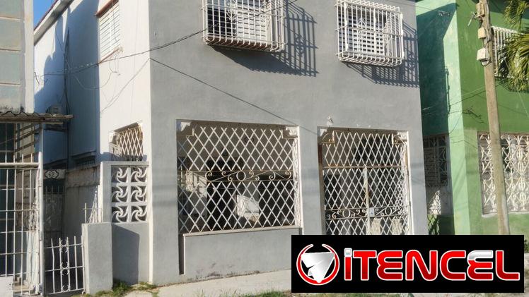 Permuto casa indpt. capitalista 3/4 garage etc. por apartamento en el Vedado
