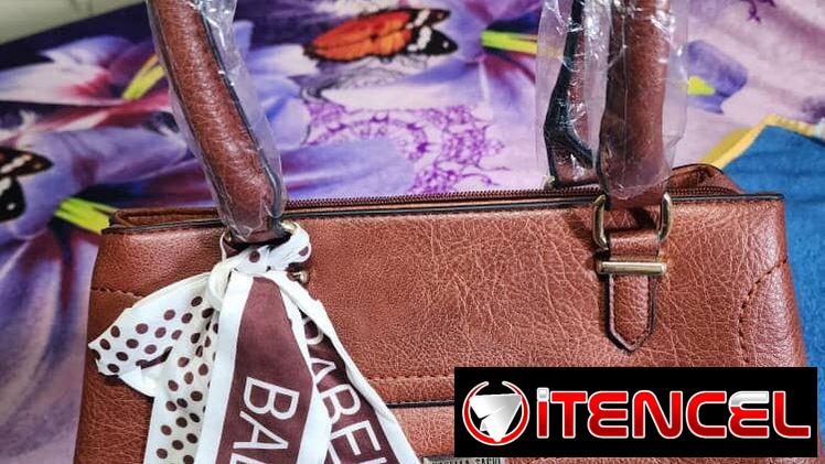 Cartera nueva en 25 usd o al cambio con asa de respuesto