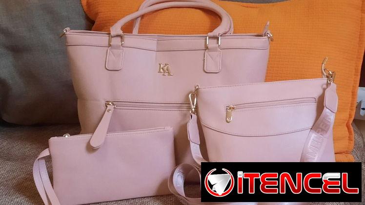 Carteras con monederos y bolsos pequeños.
