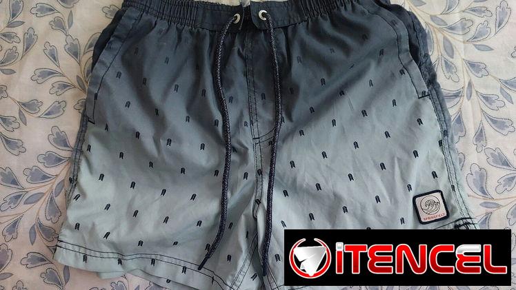 Short de Playa marca Sprintfield para niños de 15 años aproximadamente.