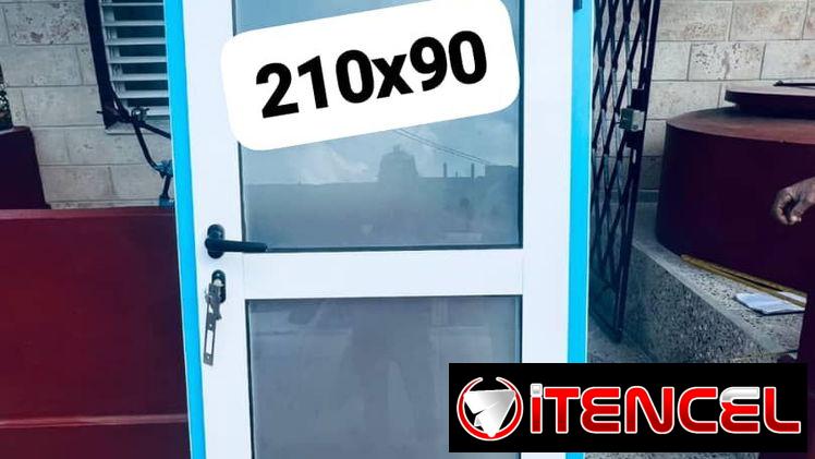 Puertas de correderas y de aluminio con cristal