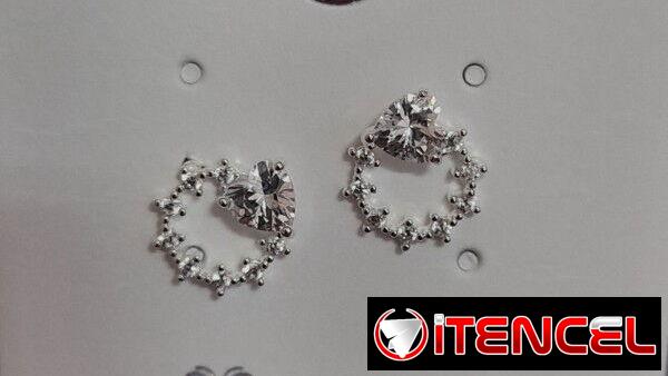 Finos Aretes plateados _Oro Laminado y Cadenas Pandora.