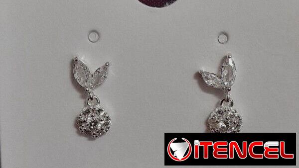 Finos Aretes plateados _Oro Laminado y Cadenas Pandora.