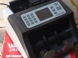 🎰Máquina de contar dinero profesional JMD  💨Velocidad de conteo: +1000 billetes/ minuto ☑️Selector de moneda y de deno