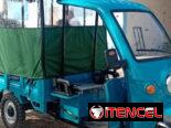 Triciclo eléctrico con cavina
