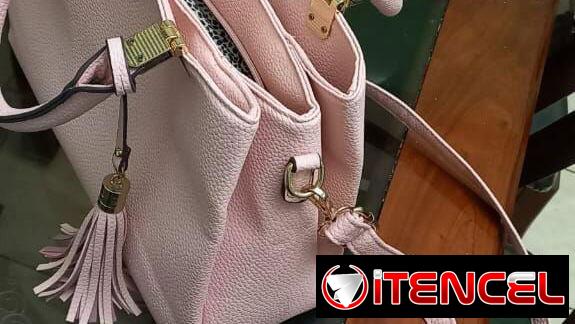 cartera rosa palo con asa corta y larga
