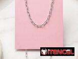 Juego de aretes cadenas y dijes