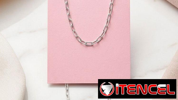 Juego de aretes cadenas y dijes