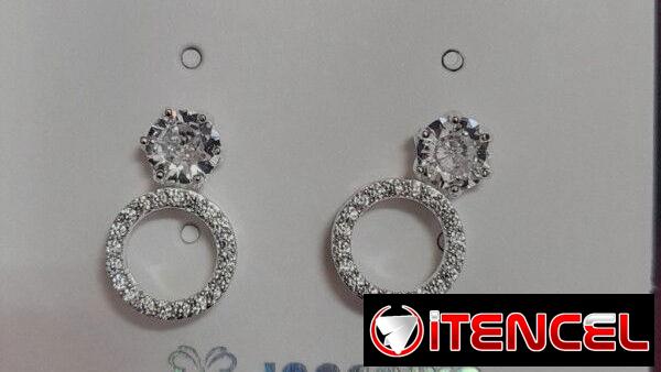 Finos Aretes plateados _Oro Laminado y Cadenas Pandora.