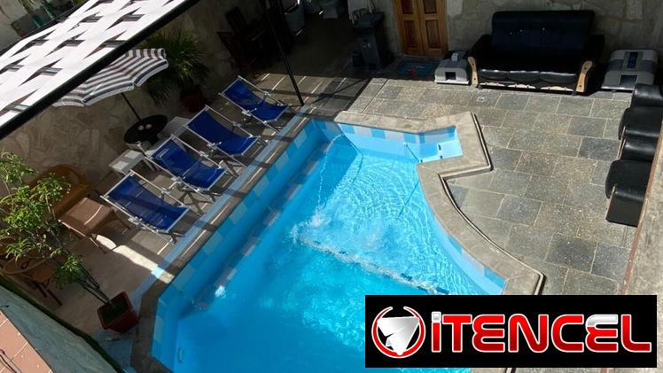 Casa Janet en renra de 3 habitaciones y piscina con sus paneles. Whatssap 5 2959440