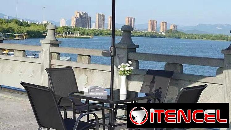 Juego de terraza , mesa con cristal templado y sombrilla desmontable , importado nuevo en caja